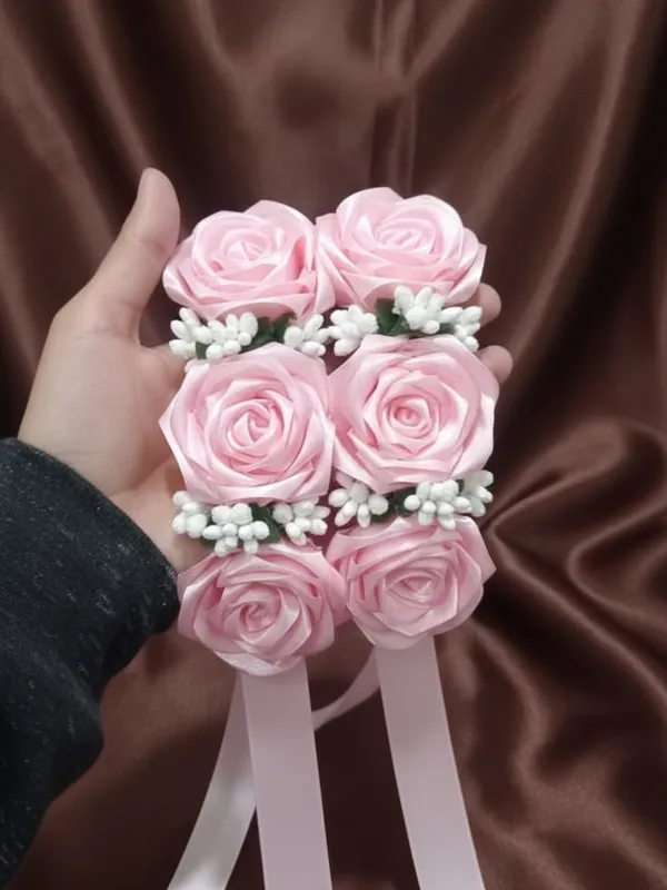 Pink satin rose gajray with white buds and ribbon ties