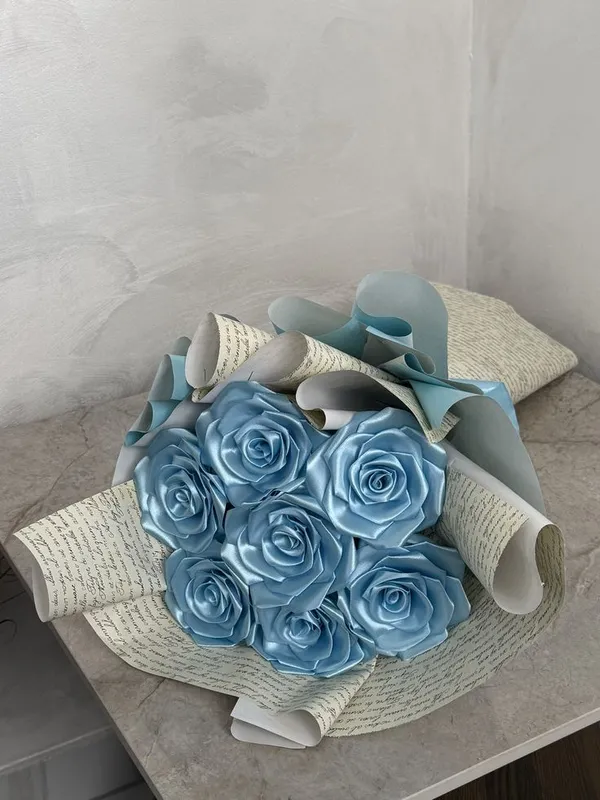 Baby blue satin roses in handwritten script print wrap