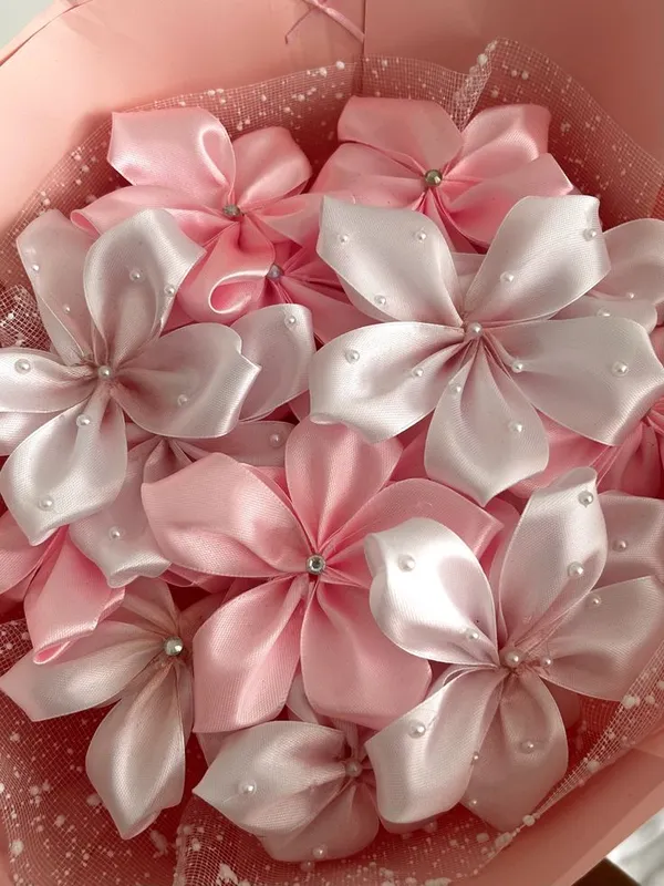 Blush and pink satin lilies decorated with pearls